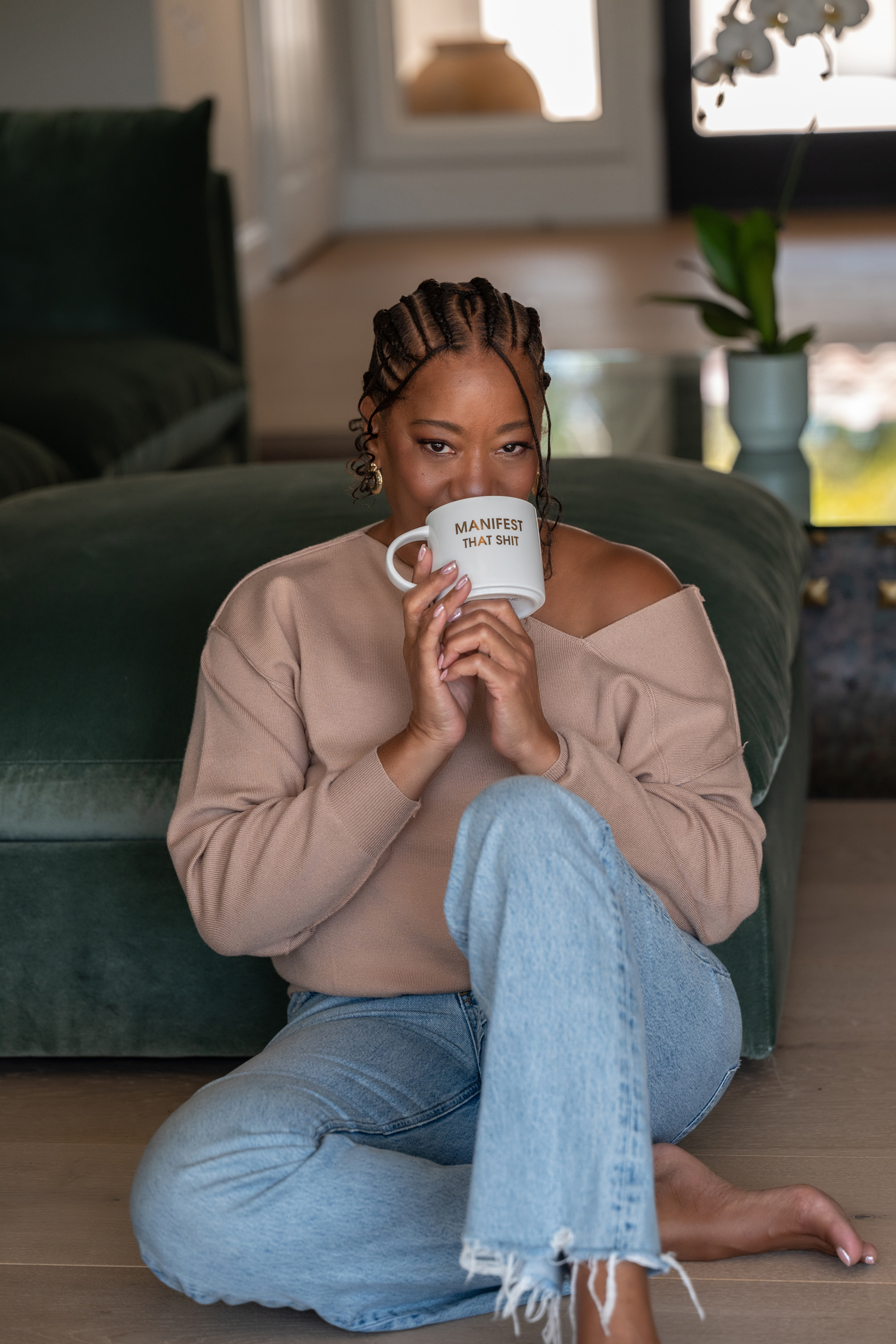 Lisane at home, mug in hand